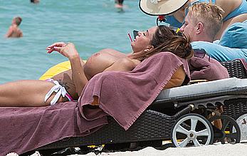 Busty Katie Price topless on a beach in Thailand