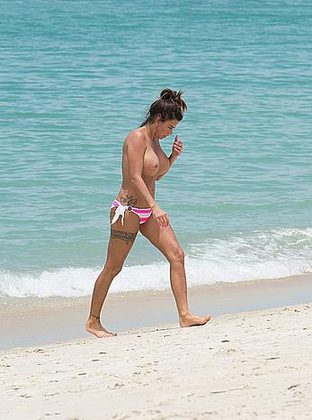 Busty Katie Price topless on a beach in Thailand