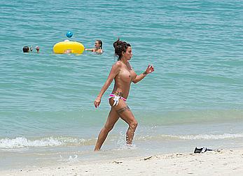 Busty Katie Price topless on a beach in Thailand