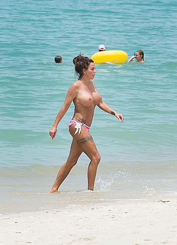 Busty Katie Price topless on a beach in Thailand