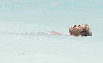 Busty Katie Price AKA Jordan sunbathing topless on vacationing in the Maldives