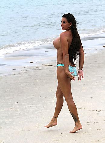 Busty Katie Price topless on a beach with boyfriend in Thailand