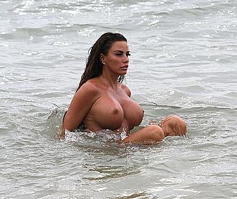 Busty Katie Price topless on a beach with boyfriend in Thailand