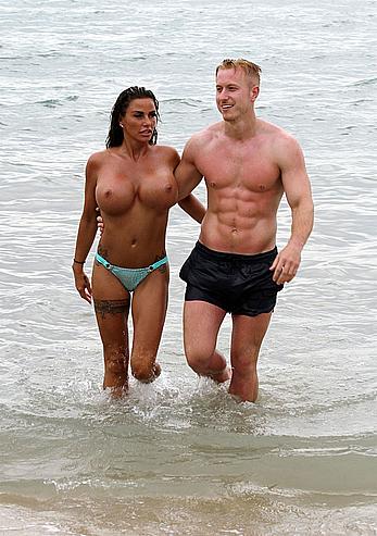 Busty Katie Price topless on a beach with boyfriend in Thailand