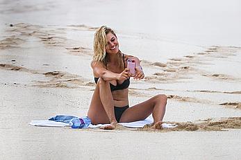 Kelly Rohrbach topless on a beach paparazzi photos