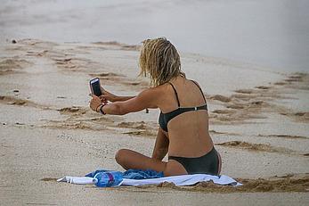 Kelly Rohrbach topless on a beach paparazzi photos