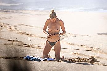 Kelly Rohrbach topless on a beach paparazzi photos