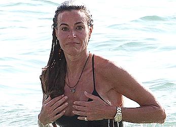 Kelly Bensimon nipple slip in black bodysuit