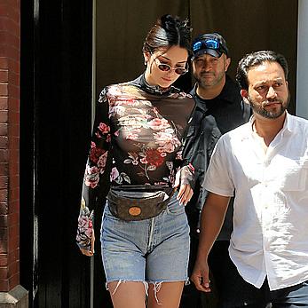 Kendall Jenner goes shopping in Soho in see through top and denim shorts