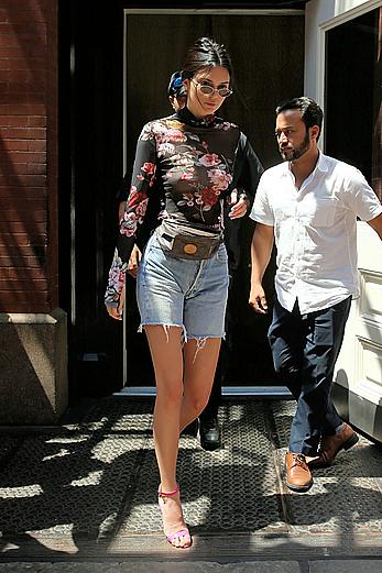 Kendall Jenner goes shopping in Soho in see through top and denim shorts