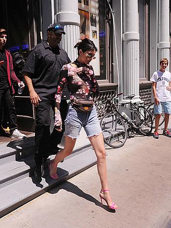 Kendall Jenner goes shopping in Soho in see through top and denim shorts