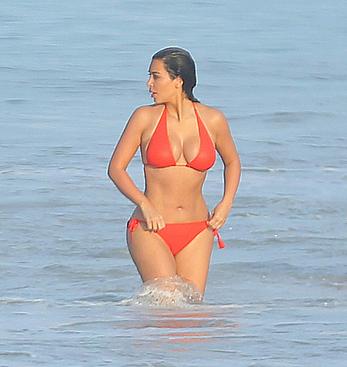 Kim Kardashian in red bikini candids on vacation in Mexico