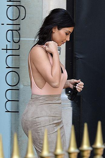 Kim Kardashian flaunt her assets in form-fitting outfit in Paris