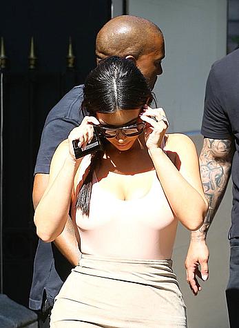 Kim Kardashian flaunt her assets in form-fitting outfit in Paris