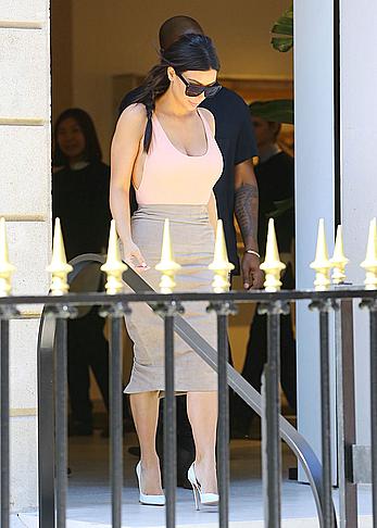 Kim Kardashian flaunt her assets in form-fitting outfit in Paris