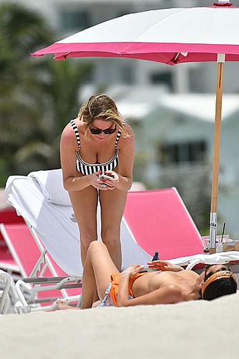 Kristen Doute topless on the beach in Miami