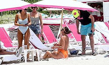 Kristen Doute topless on the beach in Miami