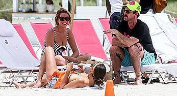 Kristen Doute topless on the beach in Miami