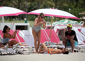 Kristen Doute topless on the beach in Miami