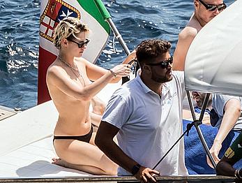 Kristen Stewart topless on a yacht in Italy