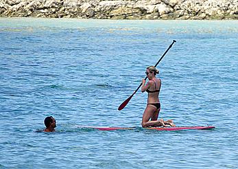 Kristin Cavallari in a bikini paddle boarding in Bali