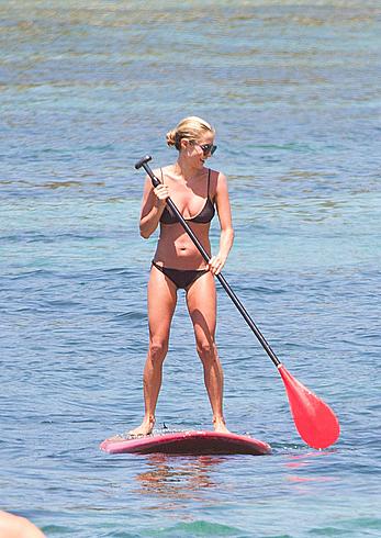 Kristin Cavallari in a bikini paddle boarding in Bali