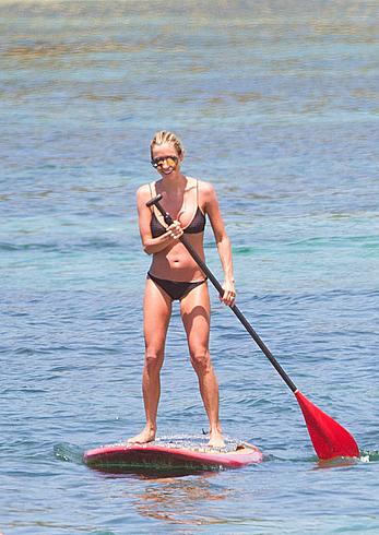 Kristin Cavallari in a bikini paddle boarding in Bali