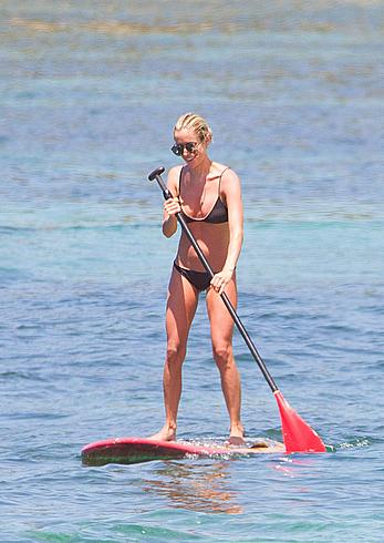 Kristin Cavallari in a bikini paddle boarding in Bali