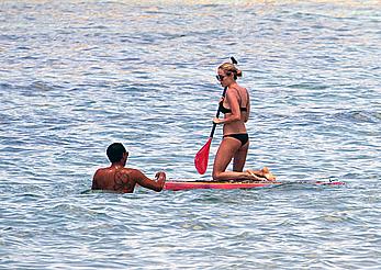 Kristin Cavallari in a bikini paddle boarding in Bali