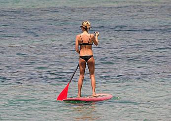 Kristin Cavallari in a bikini paddle boarding in Bali