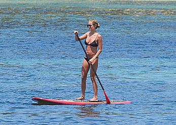 Kristin Cavallari in a bikini paddle boarding in Bali