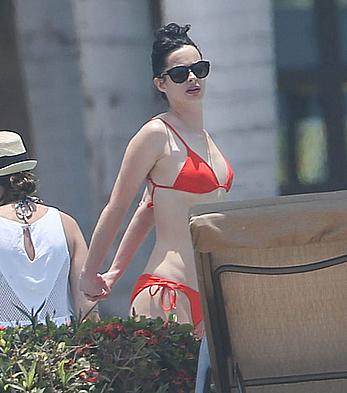 Krysten Ritter in red bikini on a beach in Mexico