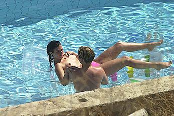 Kym Marsh topless in pink bikini panties in a pool