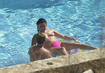 Kym Marsh topless in pink bikini panties in a pool