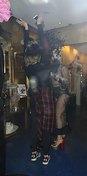 Lady Gaga topless with pasties under fishnet dress in London