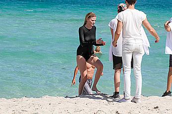 Lara Stone seen topless during a swimwear photoset on Miami Beach