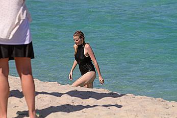 Lara Stone seen topless during a swimwear photoset on Miami Beach