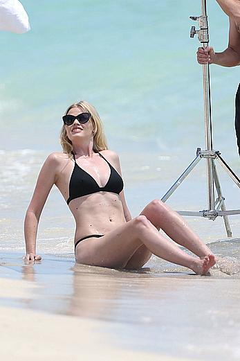 Lara Stone seen topless during a swimwear photoset on Miami Beach