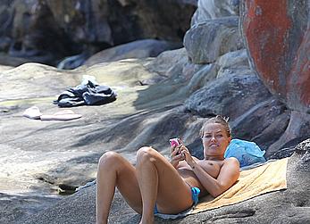 Lara Bingle sunbathing topless in Sydney