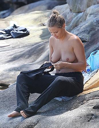 Lara Bingle sunbathing topless in Sydney