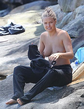 Lara Bingle sunbathing topless in Sydney