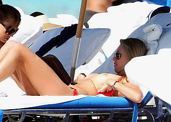 Lauren Stoner caught topless on the South Beach