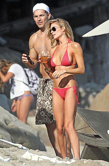 LeAnn Rimes side of boob in tiny bikini in Malibu