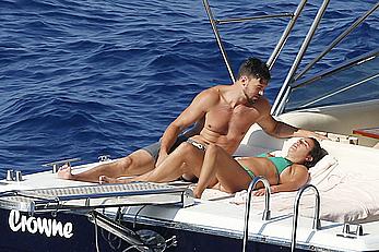 Lea Michele nipple slip in green bikini on a boat in Italy