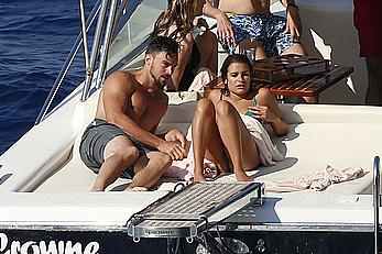 Lea Michele nipple slip in green bikini on a boat in Italy