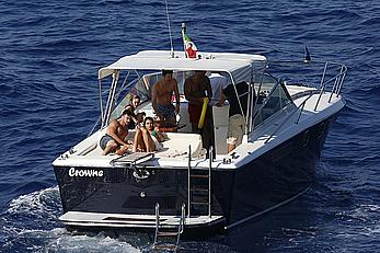 Lea Michele nipple slip in green bikini on a boat in Italy