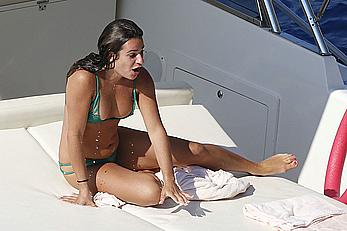 Lea Michele nipple slip in green bikini on a boat in Italy