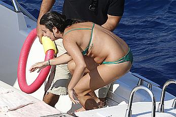 Lea Michele nipple slip in green bikini on a boat in Italy