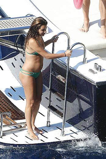 Lea Michele nipple slip in green bikini on a boat in Italy