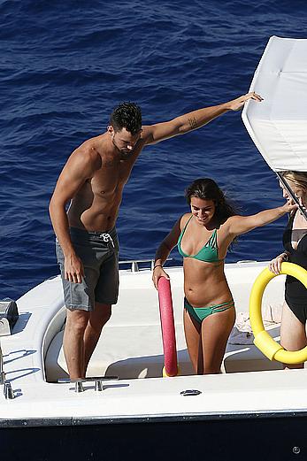 Lea Michele nipple slip in green bikini on a boat in Italy